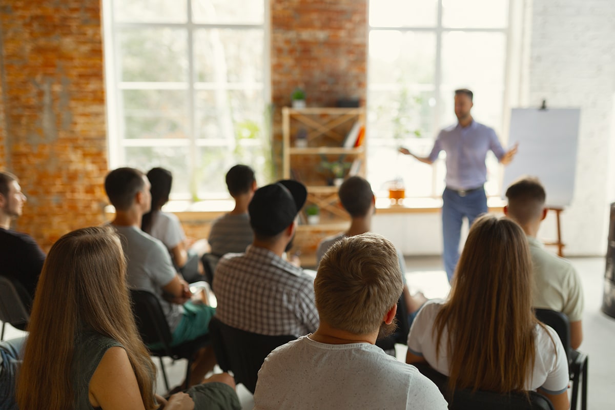 Instructor lectures to diverse work group
